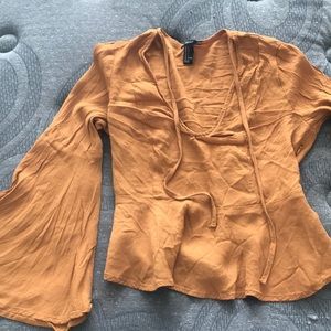 Mustard color midi peplum top with v neck